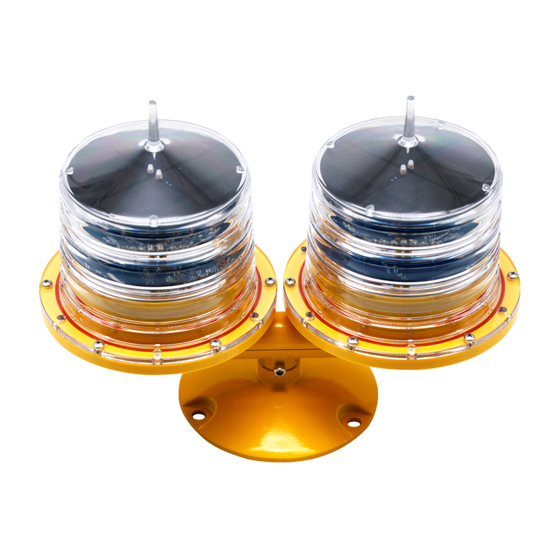 Dual solar aviation obstacle light YFFY Lights Dual yellow beacon lights on a mounting base used for safety signaling in industrial or construction settings