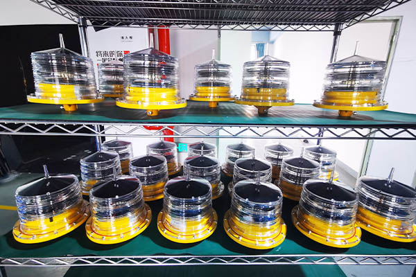 solar obstacle light YFFY Lights Row of clear plastic containers with yellow bases on metal shelves two tier display of lab style equipment