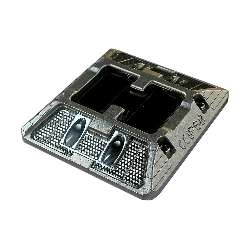 AluminumSolarRoadStudYFFYSRSA91 YFFY Lights Two slot battery charging dock with metal contact pins and a textured metal body shown at an angle