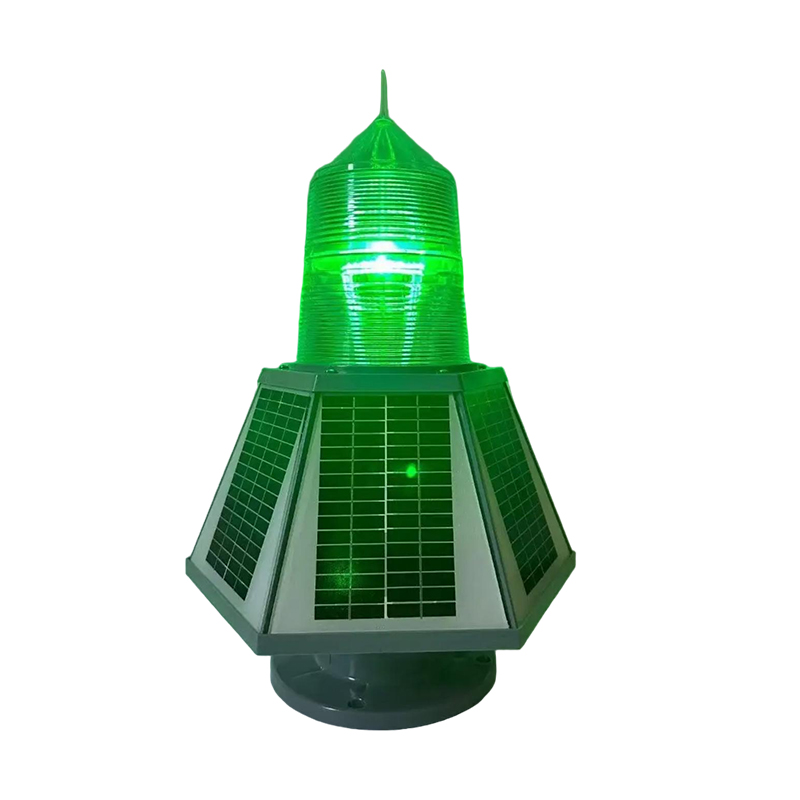 THD155 Solar Marine Lantern YFFY Lights Green solar powered beacon light with a faceted panel covered base and a bright green lens on top used for outdoor signaling