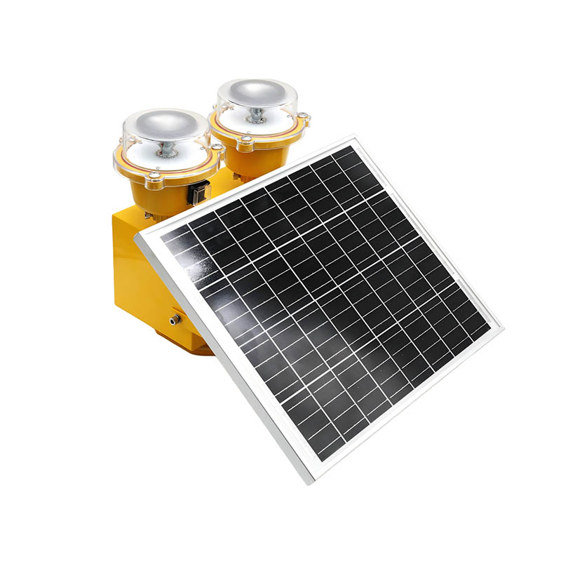 Yellow solar powered device with two round lamp heads and a tilted solar panel attached