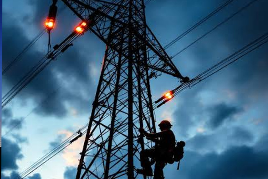 Tower Aviation Obstruction Lights Installation YFFY Lights Lineman climbing a tall transmission tower against a blue dusk sky safety gear visible