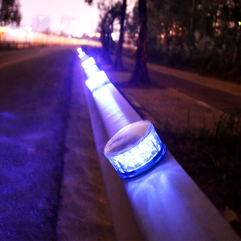 Magnetic Solar Warning Light Solar Beacon Light Solar Warning Lights YFFY Lights Blue LED emergency lights along a railing by a sidewalk at night fading into the distance
