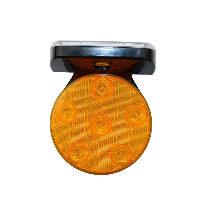 Orange circular LED beacon light with six illuminated LEDs mounted on a black bracket used as a warning signal on vehicles